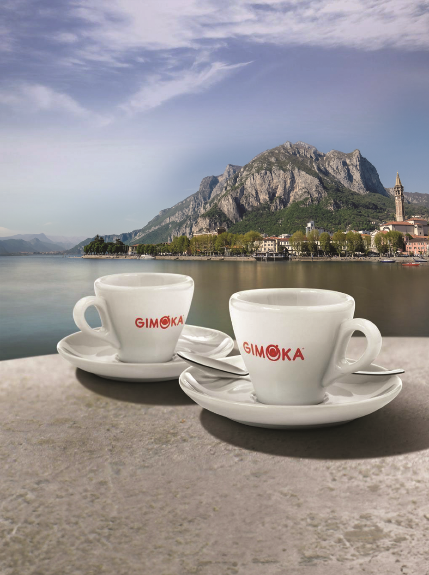 Gimoka coffee cups with a background of Lake Como